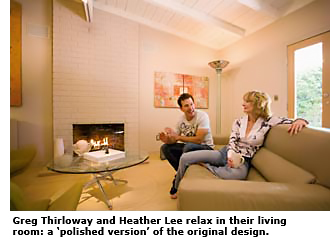 greg thirloway and heater lee on their couch in living room