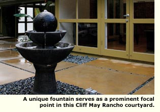 fountain in cliff may