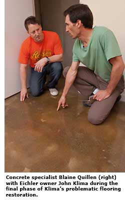 two men inspecting concrete floor