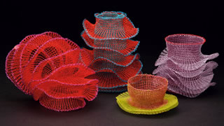 Grouping of four wire bracelets by Fisch (color-coated copper wire, 2008).