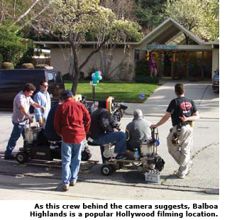 film crew in balboa highlands estates home at night