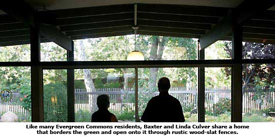 evergreen commons couple look outside their window