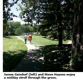 evergreen commons two residents taking a walk