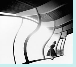 woman standing at window warped effect on image