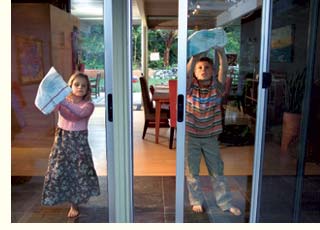kids washing glass doors