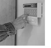 hand on thermostat